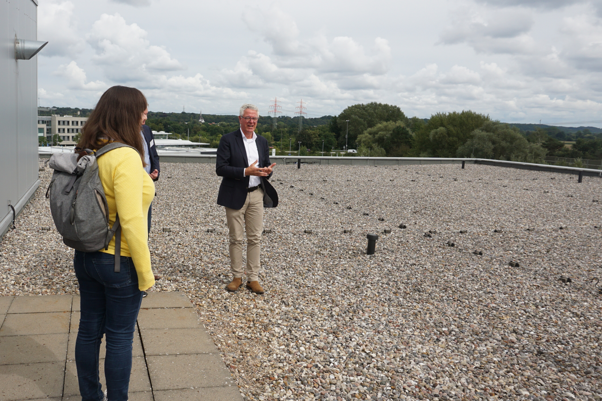 Dr Jantzen showing the planned location for the solar panel expansion